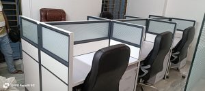 Modern office cubicle workstation featuring a white aluminum frame with a single-color fabric partition, designed for efficient workspace utilization.