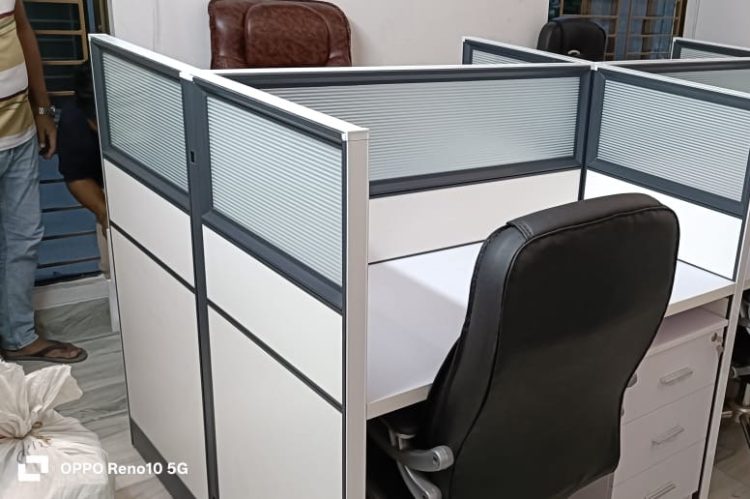 Office cubicle workstation featuring a white theme with a fabric partition and aluminum frame, designed for modern office environments.
